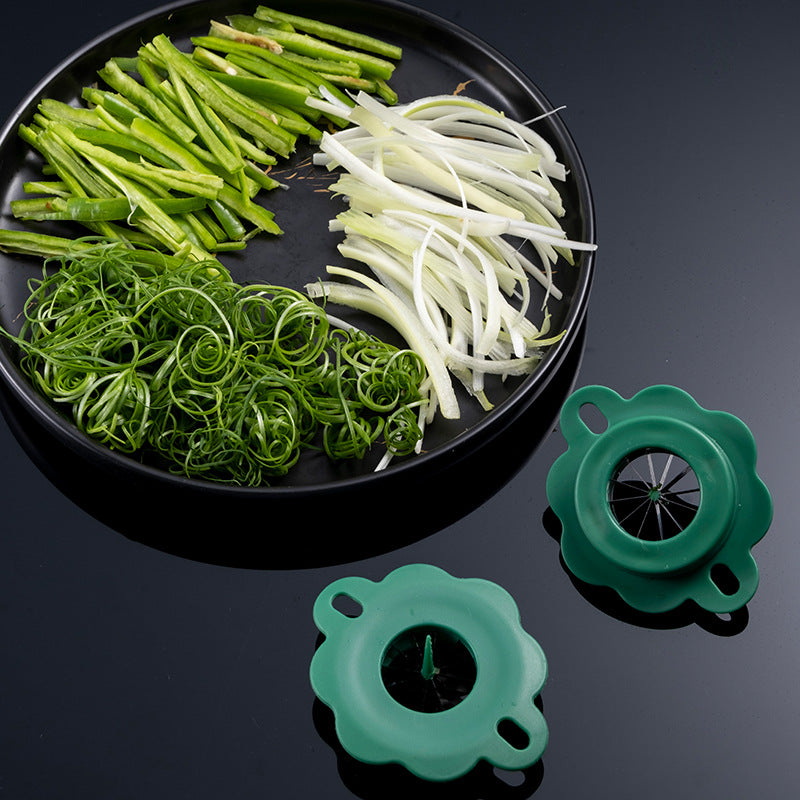 http://kitchengroups.com/cdn/shop/products/New-Green-Onion-Easy-Slicer-Shredder-Plum-Blossom-Cut-Green-Onion-Wire-Drawing-Kitchen-Superfine-Vegetable_296e5cad-c08b-44a9-8860-54651405aaff_1200x1200.jpg?v=1661967133