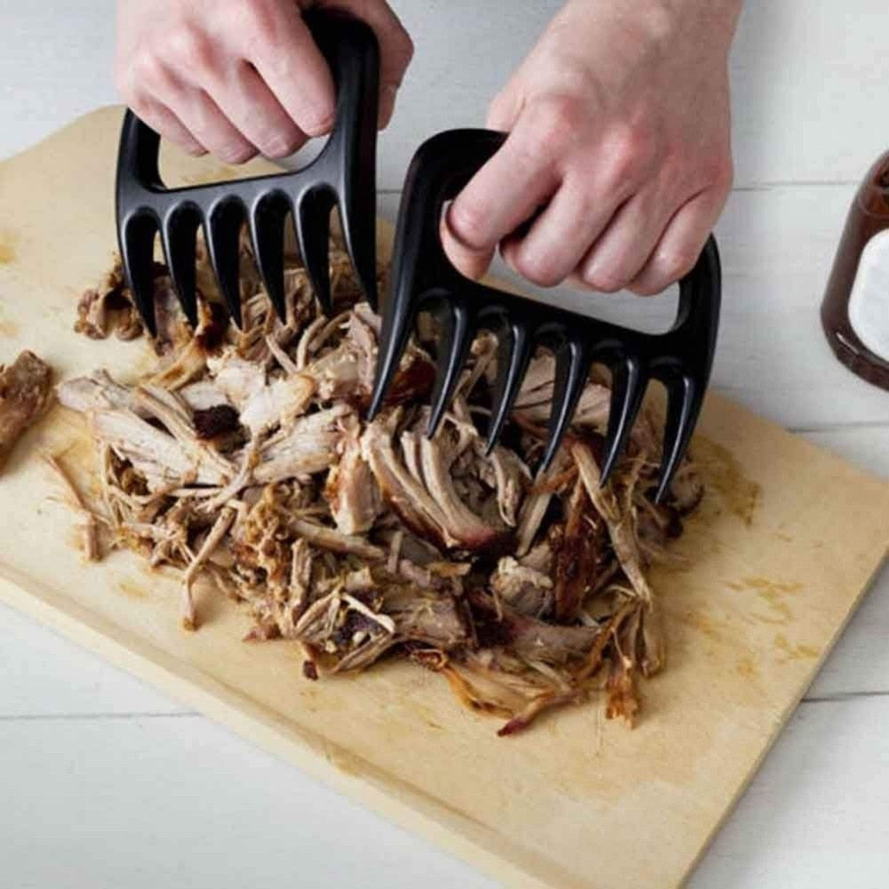 http://kitchengroups.com/cdn/shop/products/bbq-2pcs-bear-claws-barbecue-fork-tongs-pull-meat-clamp-roasting-fork-1_1200x1200.jpg?v=1651627822