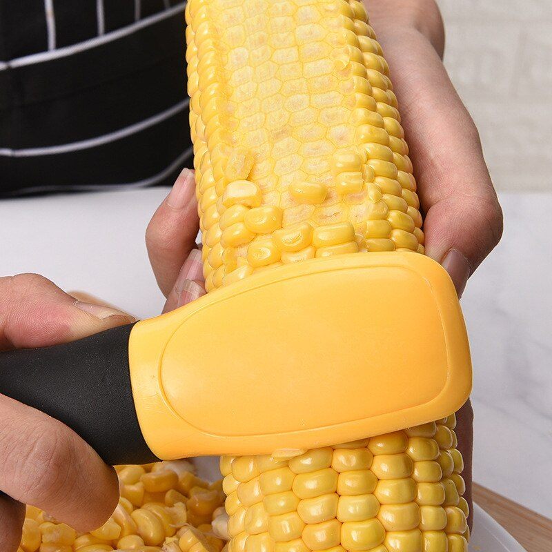 http://kitchengroups.com/cdn/shop/products/home-gadgets-corn-cob-remover-corn-kernel-cutter-stripping-tool-with-handle-2_1200x1200.jpg?v=1651632499