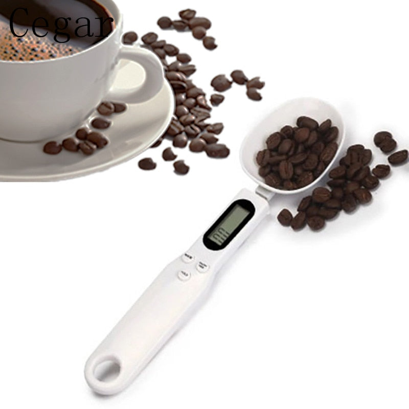 https://kitchengroups.com/cdn/shop/products/kitchen-scale-digital-measuring-spoon-lcd-display-electronic-spoon-weighing-scale-2_1800x1800.jpg?v=1682691060